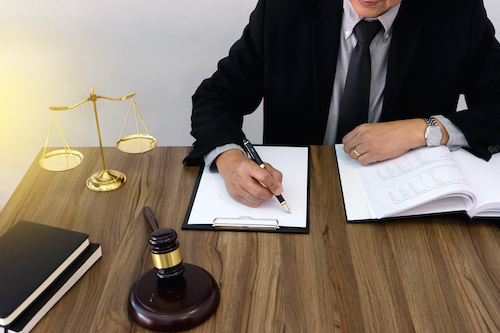 lawyer or judge work in the office with gavel and balance