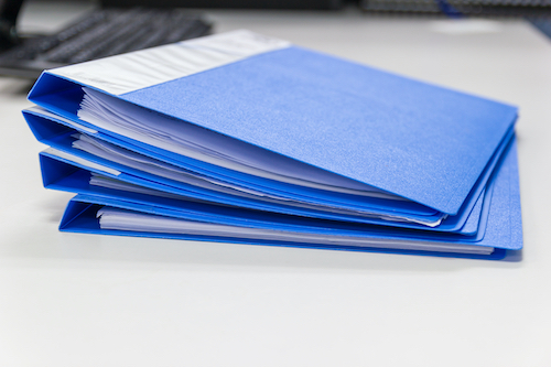 file folder and Stack of business report paper file on desk in office, business concept.